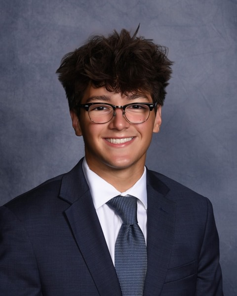 Portrait of Logan Latoff, co-founder of Lally Latoff Group